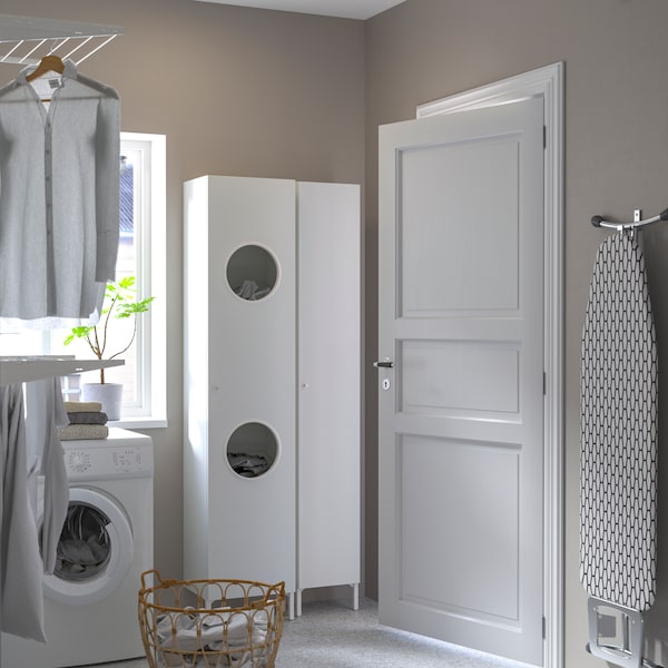A white NYSJÖN laundry cabinet
