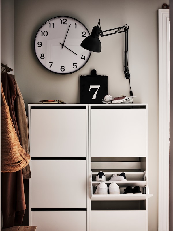 A white BISSA shoe cabinet with 3 compartments