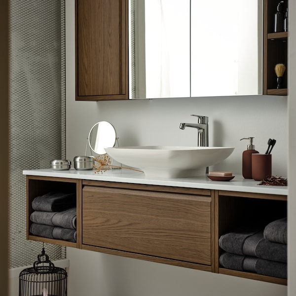 A brown oak effect ÄNGSJÖN wash-stand with drawer in the bathroom
