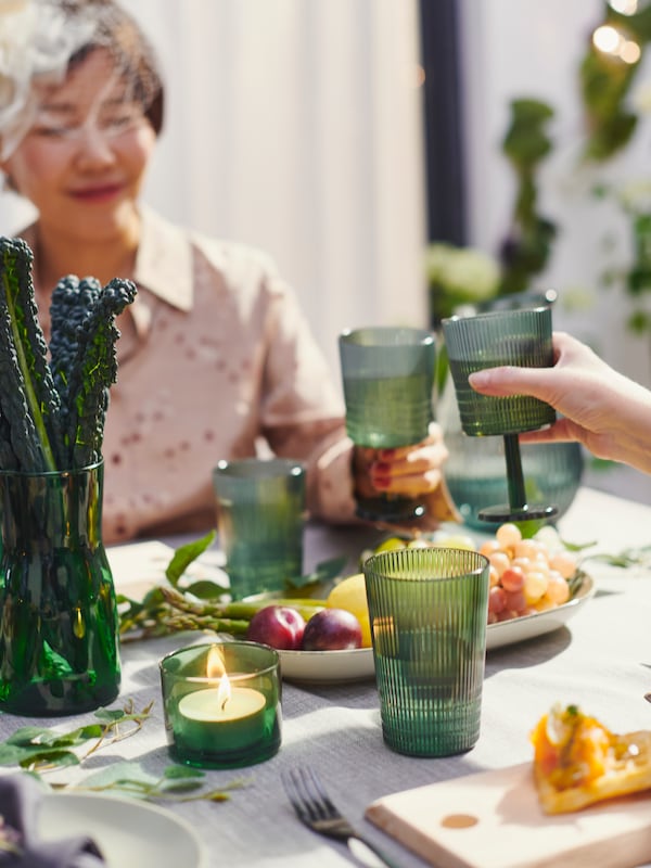 A dark green BUSKBJÖRK candle holder