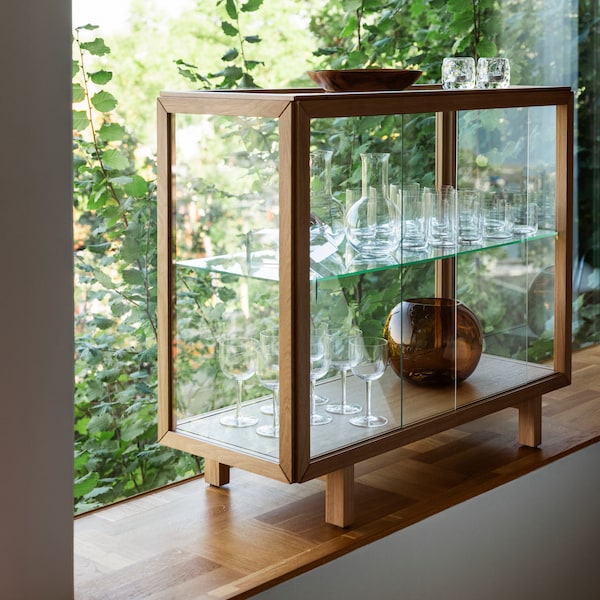 A glass STOCKHOLM 2025 carafe